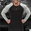 Mens Primavera-Verão Marca T-shirt Quarter Quick Dry Três luva T Casual Masculino Camisetas Bodybuilding magros