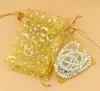 500 pcs sacs de fil bronzant cadeau bijoux sacs étoiles lune boucles d'oreilles Bracelet sac de rangement sacs de gaze colorée 9 * 12 CM