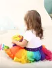 Mix 7 färger baby tjejer regnbåge net tutu kjolar barn pettiskirt klänning med båge dans kjol halloween cosplay barn kläder kläder