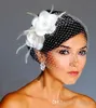 Robe de mariée de luxe Voiles de cage à oiseaux Fleurs blanches Plume Voile de cage à oiseaux Pièces de cheveux de mariage Accessoires de mariée Cap Veil Hat7479198