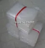 50 adet Yeni Kabarcık Çanta 30 * 35 CM Şeffaf Yastıklı Zarflar Wrap Çanta Torbalar Ambalaj PE Posta Paketleme Hava Kabarcık Çanta