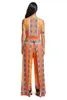 アフリカの民族印刷の女性ジャンプスーツロンパースオレンジラップディープVネックノースリーブ長い長い脚クラブパーティージャンプスーツロンパース