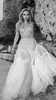 Sexig Tulle Bohemian Bröllopsklänningar Lace Applique Illusion Backless Beach Wedding Bridal Gown Custom Made Robe de Mariée