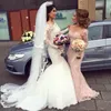 2018 Sexy Blushピンクの花嫁介添人のドレス安いVネック長袖マーメイドレースの花の名誉ガウン正式なジュニアブライドメイドのドレス