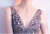 Neue Modeabendkleider lange elegante elegante Tulle V-Ausschnitt Halfter Party Ballsaal Party Kleider grau Prom Kleid Hy061