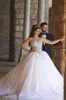 2018 Arabo manica lunga Plus Size Abiti da sposa Strass cristalli Backless Ball Gown Vintage Abiti da sposa Quinceanera Abiti
