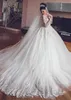 Vestidos de novia 2019 Última línea A Gran Gatsby Sparkly Garden Dubai Árabe Manga larga Capilla Tren País Vestidos de novia Ojo de cerradura