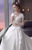 Charming Floral Applique Wedding Dress V-Neck Beaded Lace Appliqued Short Sleeve Bridal Dress Amazing Cathedral Train Tulle Wedding Dresses