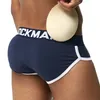 Groothandel-Jockmail Merk Verbetsende Heren Ondergoed Slips Sexy Uitpuilen Gay Penis Pad Front + Back Magic Buttock Dubbele verwijderbare Push-up Cup1