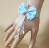 Gratis ny europeisk och amerikansk Populär Lake Blue Bowknot Drop Pearl Bracelet Belt hänvisar till mode klassiska eleganta