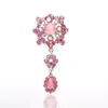 Zilveren katten oogbloem drop clear cz en strass crystal broche