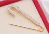 Lega color oro Splendidi cristalli trasparenti Spilla per fibbia per abiti da donna Accessori per gioielli di alta qualità Spilla per collare