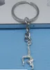 Fashion 20pcs / Lot Key Ring Keychain Smycken Silverpläterad Gymnastik Sporter Charms