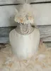 Çarpıcı Fildişi Tüy Pageant Elbise Jewel Boyun Kolsuz Balo Çiçek Kız Elbise Güzel Toddler Vaftiz Elbise vestidos de ninas