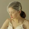 2019 våren fantastiska pärlor brud birdcage slöjor lilla blommor tulle korta bröllop slöjor mesh headpieces med liten kam