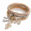 3 pezzi / set braccialetto di cristallo elastico diamante cuore corona albero della vita teschio farfalla braccialetti con ciondoli braccialetto set di polsini gioielli volontà e sabbia