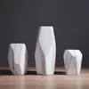 Nordisk marmor keramisk vas oregelbunden geometrisk form blomma arrangemang modern dekoration hantverk mittpunkt för hemrestaurang