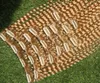 # 613 Clip bionda candeggina nelle estensioni 100G 9 pezzi / set Fasci di tessuto per capelli Remy brasiliani ricci crespi