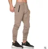 Nova tendência dos homens calças de ginástica casual elástico algodão dos homens calças de treino de fitness solto moletom camo jogger Pants214t