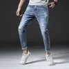 Hot selling day cultivation stretch leisure 9 points pants men break holes Haren feet nine points jeans