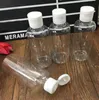 Partihandel Nya 20st / set 100 ml Plastflaskor för resor Kosmetiska lotionbehållare Refillerbara flaskor Fri frakt