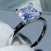 Solitaire clássico quatro garra jóias de luxo real 100 925 prata esterlina princesa corte topázio branco feminino anel de banda de casamento presente n1193491