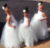 Robes de filles de fleur mignonnes col bateau sans manches en satin tulle longueur de plancher dos nu gonflé princesse enfants robes de mariée de fête d'anniversaire