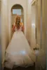 V-ringning Applique spets a-line plus size bröllopsklänning elegant tyll brudklänning drömklänning för bröllop