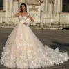2018 Enchantment A-Line Tulle Wedding Gown Sexy Sheer Long Sleeves Floral Lace Applique Bridal Dress Crystal Design Couture Wedding Dresses