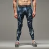 メンズスポーツランニングパンツジョギング迷彩グラフィティ圧縮メンズタイツトレーニングPantalon Broekpakマラスホムレジム男のレギンス