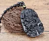 Livraison gratuite - pendentif en obsidienne naturelle sculptée à la main. Monde de la nage du dragon (ellipse)... Pendentif collier talisman.