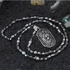 Collana con pendente a testa di leone in acciaio inossidabile punk per uomo Collana con perline in pietra di ferro grigio africano Collana lunga 75 cm Accessorio vintage