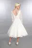 Abito da sposa corto lunghezza del tè con maniche piene lunghe V Neck in rilievo A-Line Lunghezza da tè Abiti da sposa 50s Couture Custom