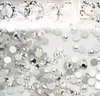 1440pcs / lot nagelkonst glitter rhinestones vit kristallklar flatback diy tips klistermärke pärlor nagel smycken tillbehör gratis frakt