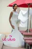 Mermaid African Nigerian Wedding Dress Sheer Neck Full Lace Applique Sleeveless Sweep Train White Ivory Garden Church Chapel Bridal Gowns