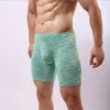 Pantaloncini boxer lunghi da uomo di marca moda allentati sexy mutande dal design convesso a U mutande sportive anti-attrito boxer da jogging maschile