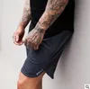 Mode män aktiva kläder 2019 män bermuda maskulina högkvalitativa lösa kompression shorts för starka gymkläder för män