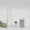 Botellas de rodillo de aceites esenciales transparentes de vidrio Botellas de aceite esencial de perfume recargables de 10 ml con rodillo de acero inoxidable y tapa plateada
