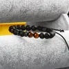 Gioielli da uomo potenti all'ingrosso 10 pz / lotto Cubic Micro Pave Black CZ Spacer Beads Macrame Bracciale con perline di pietra occhio di tigre naturale