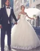 Dit Mhamad robes de mariée en dentelle élégantes Appliques hors-la-épaule Tulle robes de bal de mariée robes de mariée sur mesure DH4235