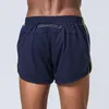 Esportes homens com shorts respiráveis ​​rápida seca preta cinza academia curta homme grande tamanho285n