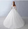 Nuevos vestidos de novia de arrastre con hombros blancos de arroz de alta calidad, encaje sin tirantes, calcomanías de encaje de otoño e invierno, vestidos de iglesia con pompón con cuentas