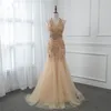 2018 elegantes Halfter goldenes Organza bodenlanges Strass-Abendkleid Sexy rückenfreies ärmelloses Meerjungfrau-Abschlussballkleid Perlengürtel Partykleid