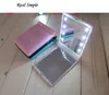 Portable LED-lampor Makeup spegel med 8 LED-lampor Lampor Kosmetisk vikning Bärbar kompaktficka Handspegel Gör upp under ljus