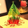 Carte regalo di buon Natale 3D Xmas Tree Laser Pop Up Biglietto d'auguri pieghevole per Navidad Natal Capodanno Carte di bomboniere