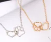 Hot style Simple European and American pet paw paw heart pendant with hollow clavicle chain necklace is fashionable and classic