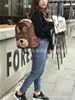 Koreanska tjejer ryggsäck tonåring barn tecknad brittiska stil axlar väskor barn skolväskor tjejer fritid resväskor julklappar