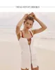Ny europeisk design kvinnors sexiga spaghetti rem suspender white color spännen patchwork bodycon tunic kort denim jeans klänning