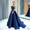 Gorgeous Beaded High Neck Aftow Dress Navy Blue Satin A Line Prom Klänningar Sheer Långärmade Arabiska Formella Party Gowns Custom Made