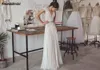 Amandabridal Boho Suknie ślubne Lihi Hod 2022 Bohemian Bridal Suknie z rękawami z czapką i plisowana spódnica na szyję elegancka ALINE BRI9229741